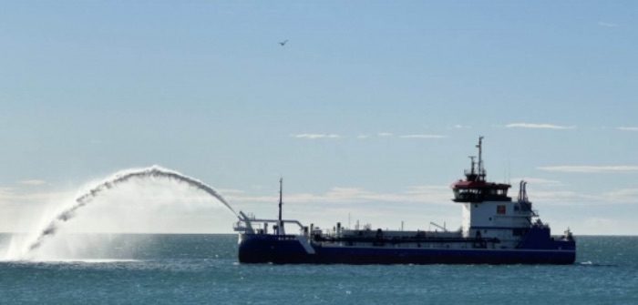 Hydrome Dredger arrives at the Port of Sète for hydrogen technology retrofitting The hydromer dredger travels on a flat ocean.