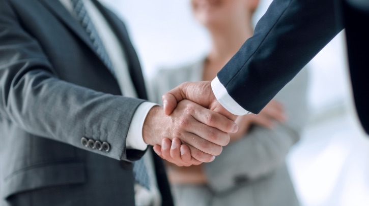 PowerCell receives Skr44m order for marine fuel cell system A closeup of a handshake.
