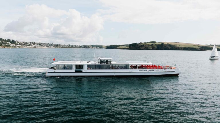 Side view of the Silver Raven sightseeing vessel on calm waterway